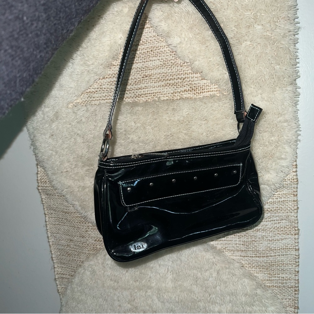 Lei vintage purse 🖤